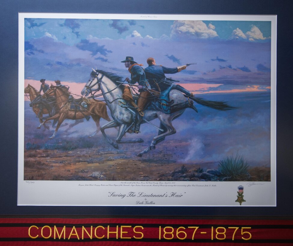 Buffalo Soldier prints, by famed historical artist Dale Gallon, hang in the U.S. Army Reserve Command Headquarters on Fort Bragg, N.C., Feb. 12, 2013. The prints, located on the first floor near the USARC G-4, are in commemoration of Black History month.