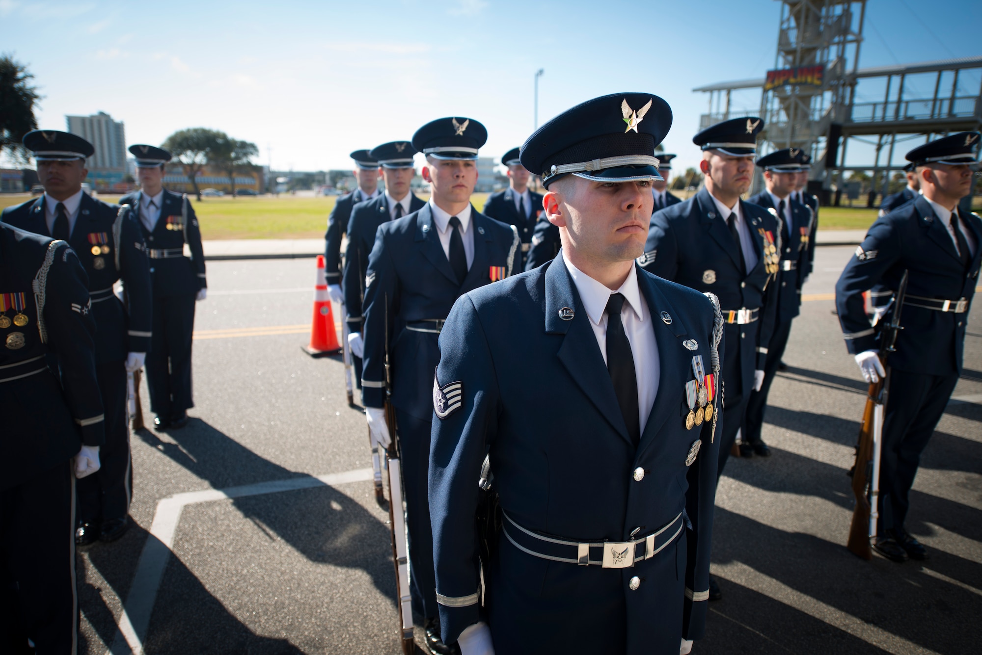 Members of the United States Air Force Honor Guard stand at attention after performing in a Martin Luther King Jr. parade in Myrtle Beach, S.C. Jan. 18, 2016. Myrtle Beach was one of several locations the Honor Guard performed at during their most recent public outreach mission. (U.S. Air Force photo by Staff Sgt. Chad C. Strohmeyer/Released)