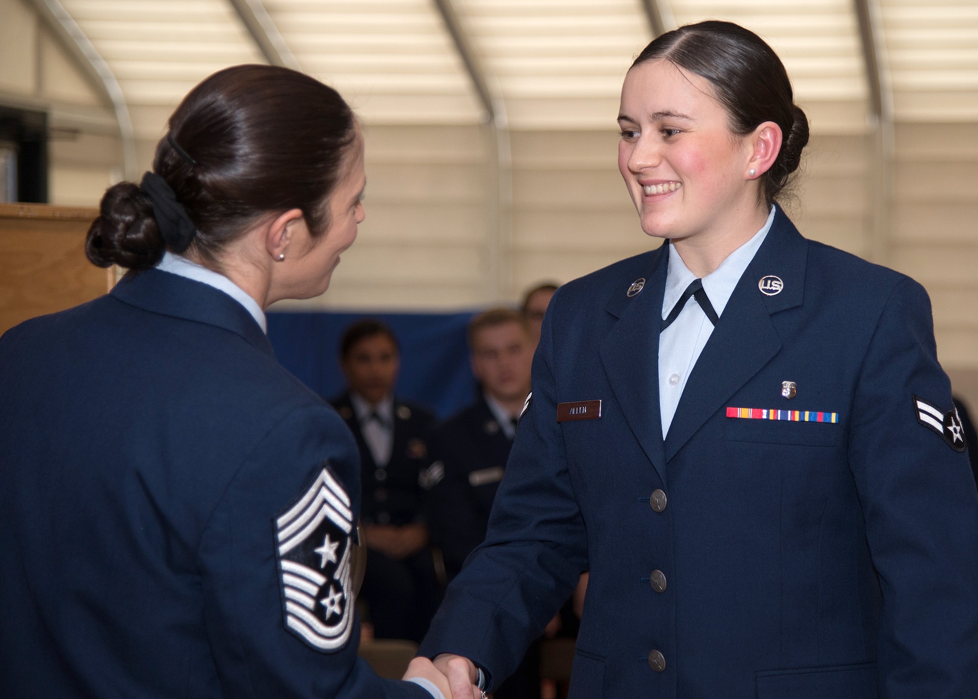 Hanscom Air Force Base Command Chief Master Sgt. Patricia L. Hickey congratulates Airman 1st Class Audrey Allen, 66th Medical Squadron, during the monthly enlisted promotion ceremony at the Minuteman Commons Jan. 29. The monthly enlisted promotion ceremony, generally held the last duty day of the month, gives the Hanscom community a chance to recognize enlisted Airman selected for promotion. (U.S. Air Force photo by Mark Herlihy