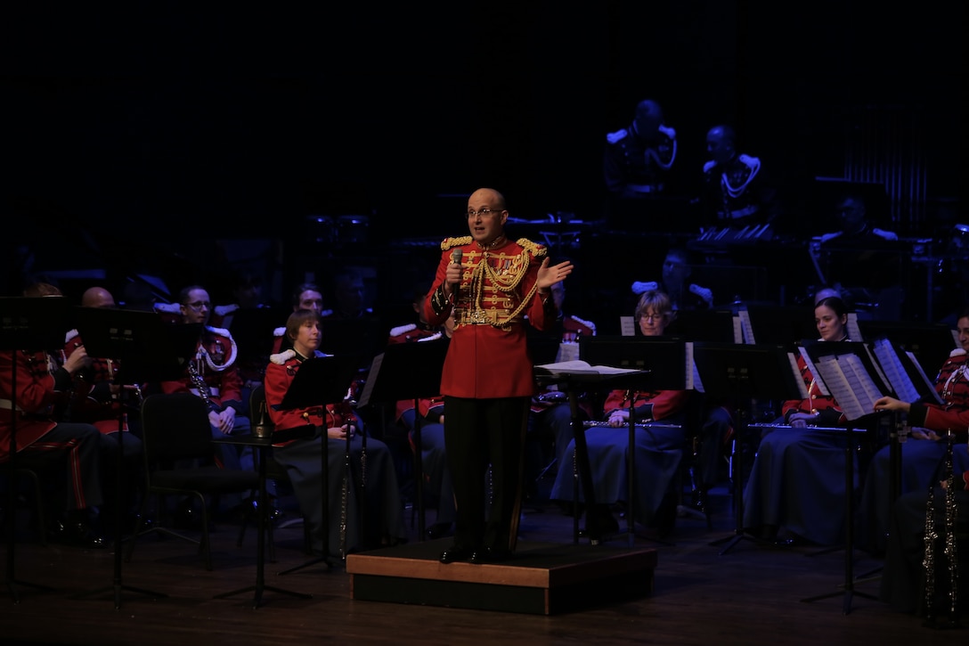 On Sunday, Jan. 31, 2016 Assistant Director 1st Lt. Ryan J. Nowlin led the Marine Band in a program titled "Childhood Dreams" at the Rachel M. Schlesinger Concert Hall at Northern Virginia Community College in Alexandria. Tom Davoren, the composer of the selection "Ascension," was on hand to enjoy the standing ovation his music elicited from the audience. (U.S. Marine Corps photo by Master Sgt. Kristin duBois/released)