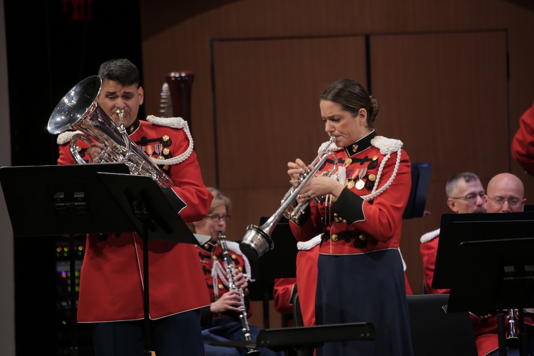 On Sunday, Jan. 31, 2016 Assistant Director 1st Lt. Ryan J. Nowlin led the Marine Band in a program titled "Childhood Dreams" at the Rachel M. Schlesinger Concert Hall at Northern Virginia Community College in Alexandria. Tom Davoren, the composer of the selection "Ascension," was on hand to enjoy the standing ovation his music elicited from the audience. (U.S. Marine Corps photo by Master Sgt. Kristin duBois/released)