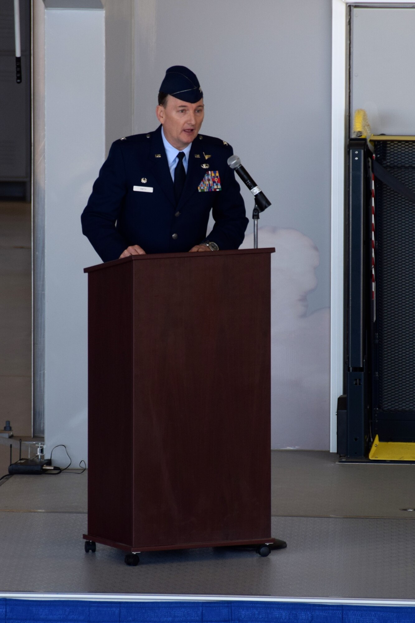 Col. Thomas T.K. Smith, Jr., speaks after taking command of the 433rd Airlift Wing 
during a change of command ceremony Jan. 30, 2016. Smith now leads the Alamo Wing, the home of the C-5M Super Galaxy, which consists of approximately 2,400 members who provide combat-ready airlift and many other types of missions around the globe at a  moments notice. (U.S. Air Force photo/Senior Airman Bryan Swink)
