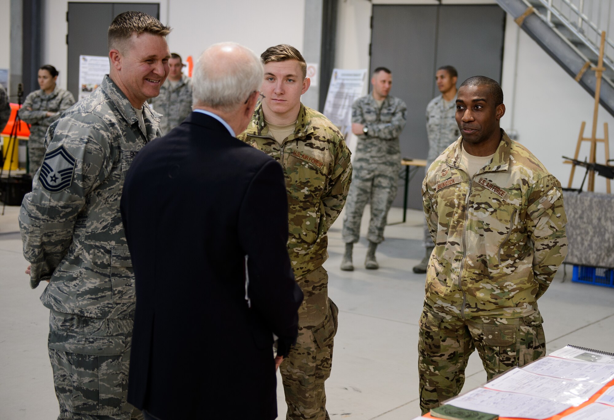 Joint terminal attack controllers from the 2nd Air Support Operations Squadron brief Sam E. Parish, retired Chief Master Sergeant of the Air Force, on recent exercises and the squadron’s accomplishments Jan. 26, 2016 at Ramstein Air Base, Germany. For one part of Parish visit in Germany he saw the 435th Air Ground Operations Wing to learn about their capabilities and accomplishments. (U.S. Air Force photo/Staff Sgt. Armando A. Schwier-Morales)