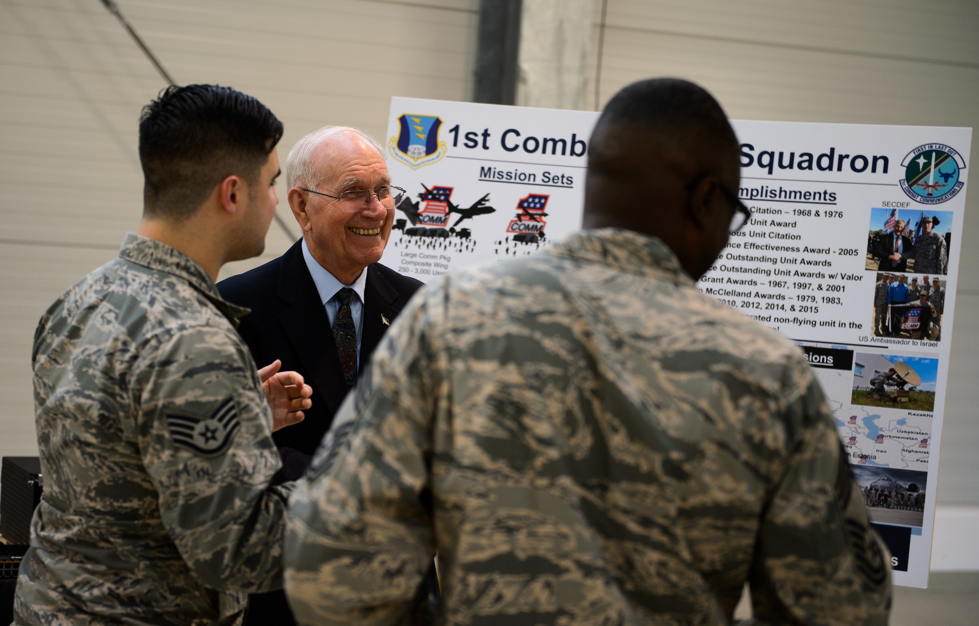 Sam E. Parish, retired Chief Master Sergeant of the Air Force, laughs with Airmen from the 1st Combat Communications Squadron Jan. 26, 2016 at Ramstein Air Base, Germany. Many of the 435th Air Ground Operations Wing units showcased their missions to Parish during his visit to Ramstein. During his visit Parish also learned about the three wings at Ramstein and was the guest speaker at the chief master sergeant’s induction ceremony. (U.S. Air Force photo/Staff Sgt. Armando A. Schwier-Morales)