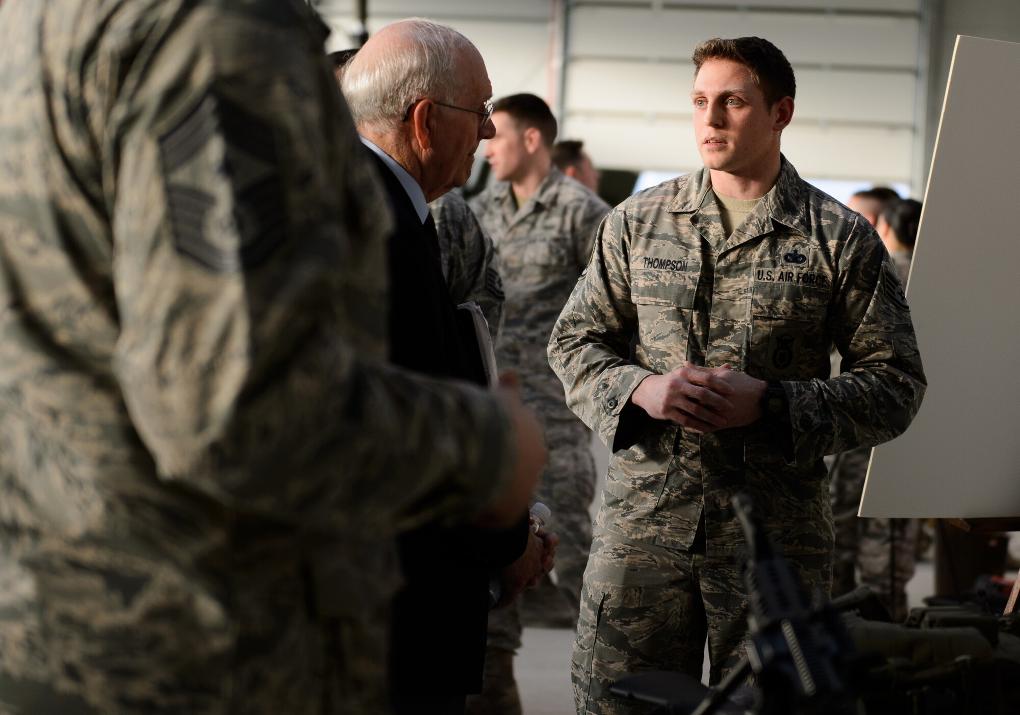 Staff Sgt. Michael Thompson, 435th Security Forces Squadron fly-away security team NCO in charge, explains the courses taught by his squadron to Sam E. Parish, retired Chief Master Sergeant of the Air Force, Jan. 26, 2016 at Ramstein Air Base, Germany. Many of the 435th Air Ground Operations Wing units showcased their missions to Parish during his visit to Ramstein. During his visit Parish also learned about the three wings at Ramstein and was the guest speaker at the chief master sergeant’s induction ceremony. (U.S. Air Force photo/Staff Sgt. Armando A. Schwier-Morales)