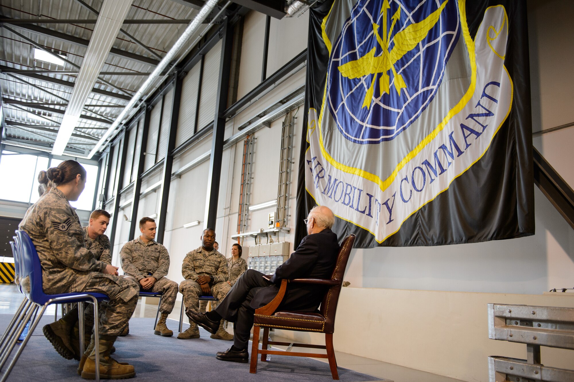 Airmen from the 521st Air Mobility Operations Wing brief Sam E. Parish, retired Chief Master Sergeant of the Air Force, on their missions Jan. 27, 2016, at Ramstein Air Base, Germany. Airmen from the 521st Air Mobility Operations Wing had an opportunity to meet Parish and discuss the differences from when Parish enlisted and the current Air Force. Parish was the guest speaker at a variety of venues including Airman Leadership School, squadron all calls, and the chief induction ceremony as part of his visit. (U.S. Air Force photo/Staff Sgt. Armando A. Schwier-Morales)