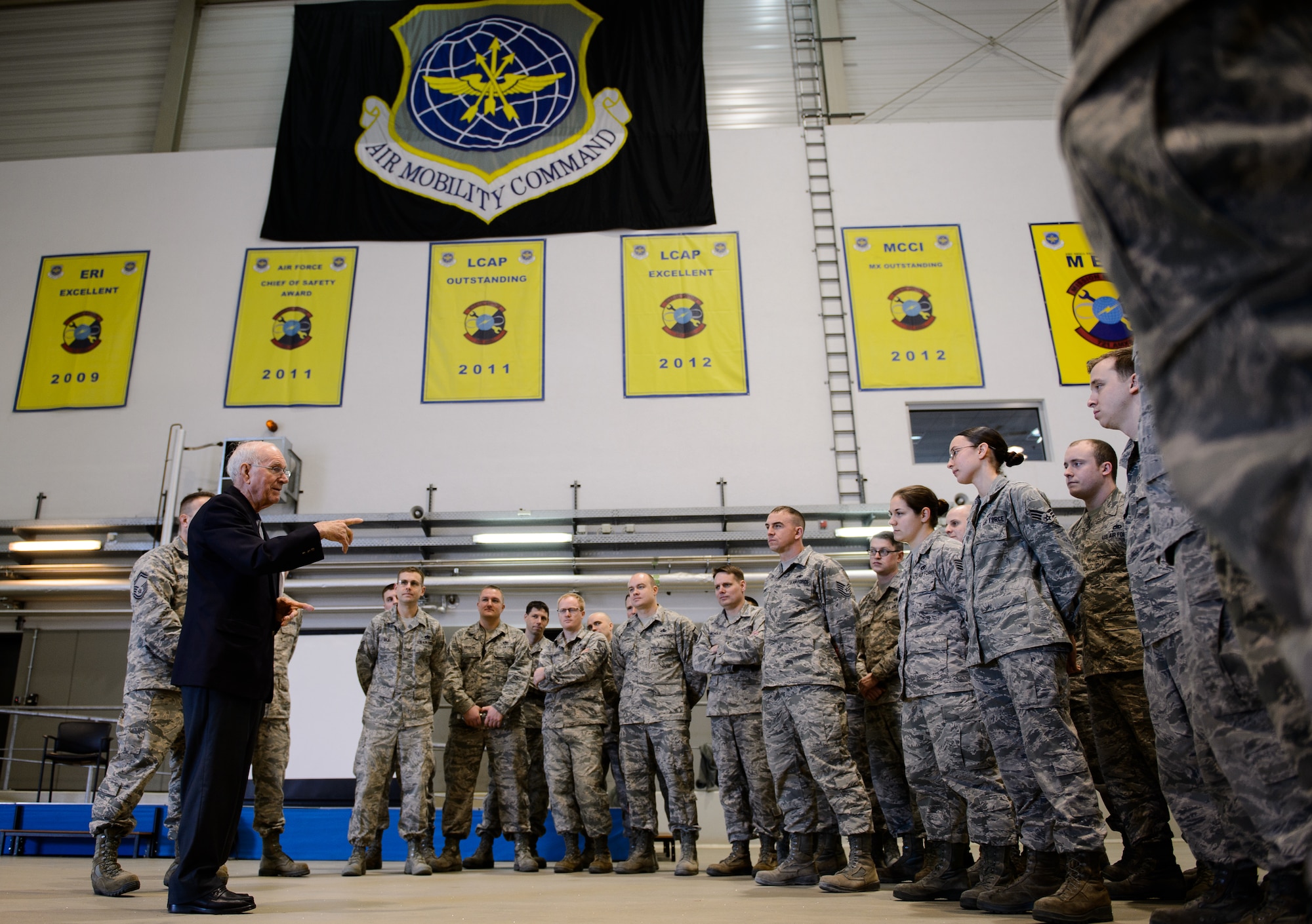 Sam E. Parish, retired Chief Master Sergeant of the Air Force, talks about Air Force jobs and their impact on the mission Jan. 27, 2016, at Ramstein Air Base, Germany. Airmen from the 521st Air Mobility Operations Wing had an opportunity to meet Parish and discuss the differences from when Parish enlisted and the current Air Force. Parish was the guest speaker at a variety of venues including Airman Leadership School, squadron all calls, and the chief induction ceremony as part of his visit. (U.S. Air Force photo/Staff Sgt. Armando A. Schwier-Morales)