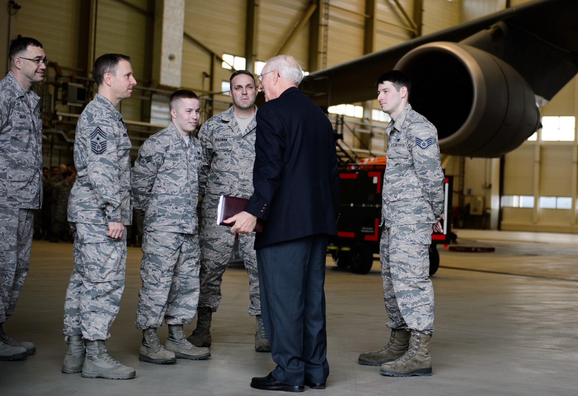 Sam E. Parish, retired Chief Master Sergeant of the Air Force, interacts with Airmen of the 721st Aircraft Maintenance Squadron Jan. 27, 2016, at Ramstein Air Base, Germany. Airmen from the 521st Air Mobility Operations Wing had an opportunity to meet Parish and discuss the differences from when Parish enlisted and the current Air Force. Parish was the guest speaker at a variety of venues including Airman Leadership School, squadron all calls, and the chief induction ceremony as part of his visit. (U.S. Air Force photo/Staff Sgt. Armando A. Schwier-Morales)