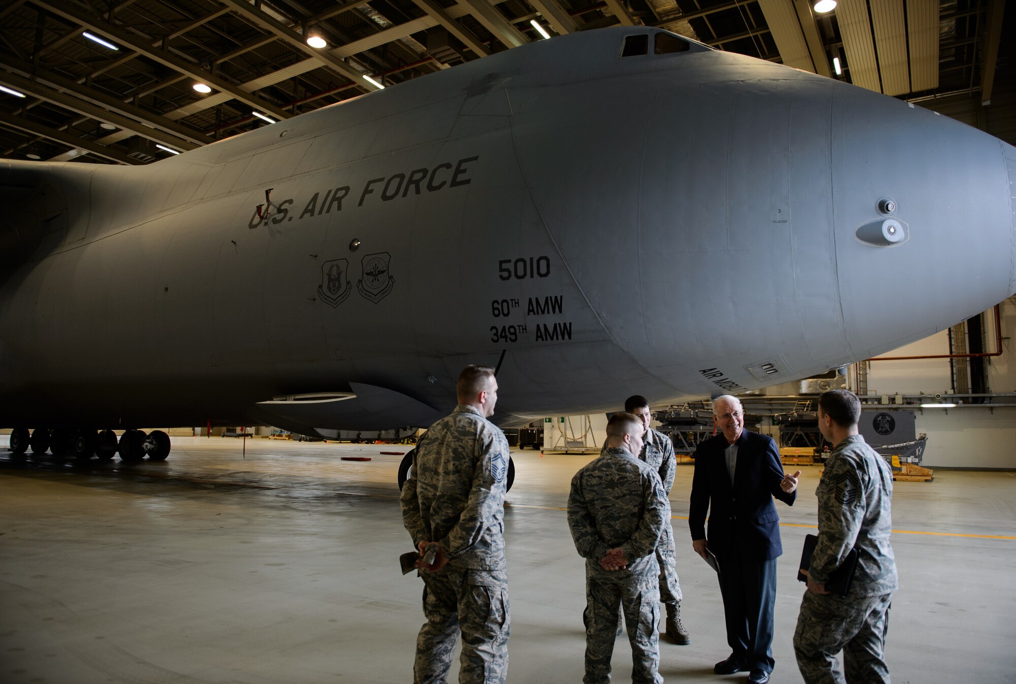 Sam E. Parish, retired Chief Master Sergeant of the Air Force, interacts with Airmen of the 721st Aircraft Maintenance Squadron Jan. 27, 2016, at Ramstein Air Base, Germany. Airmen from the 521st Air Mobility Operations Wing had an opportunity to meet Parish and discuss the differences from when Parish enlisted and the current Air Force. Parish was the guest speaker at a variety of venues including Airman Leadership School, squadron all calls, and the chief induction ceremony as part of his visit. (U.S. Air Force photo/Staff Sgt. Armando A. Schwier-Morales)