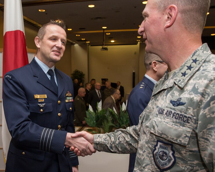 (Right to left) U.S. Air Force Lt. Gen. John Dolan, the commander of U.S. Forces Japan and the 5th Air Force, greets Royal Australian Air Force Group Captain Michael Jansen, United Nations Command (Rear) commander, after the UNC (Rear) change of command ceremony at Yokota Air Base, Japan, Jan. 26, 2016. As the United Nations Command’s principal representative in Japan, the UNC (Rear) maintains the status of forces agreement regarding United Nations Forces in Japan during armistice conditions. (U.S. Air Force photo by Osakabe Yasuo/Released)