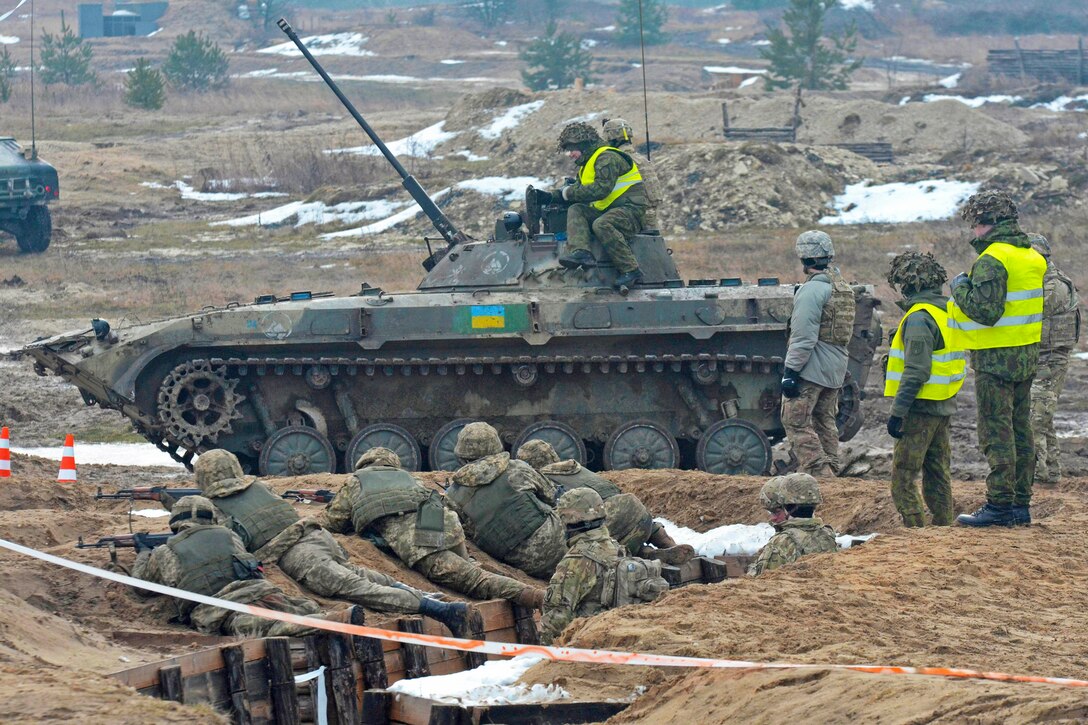 U.S. and Ukrainian soldiers learn defensive combat skills as they conduct live-fire training at the International Peacekeeping Security Center near Yavoriv, Ukraine, Jan. 29, 2016. The U.S. soldiers are paratroopers assigned to  the 173rd Airborne Brigade. Army photo by Staff Sgt. Adriana M. Diaz-Brown