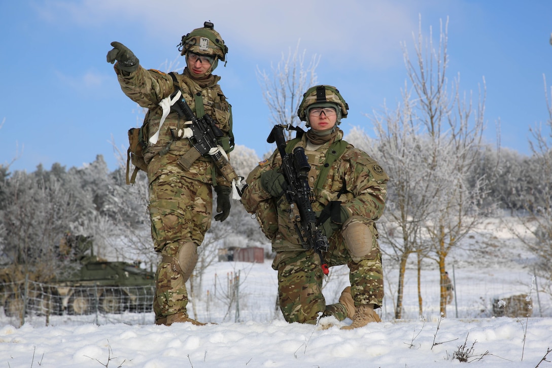 Army Sgt. Vince Shaul instructs a fellow soldier during exercise Allied Spirit IV at the U.S. Army’s Joint Multinational Readiness Center in Hohenfels Training Area, Germany, Jan. 22, 2016. The exercise boosts interoperability and communications among NATO members and partner nations. Army photo by Pfc. Michael Bradley