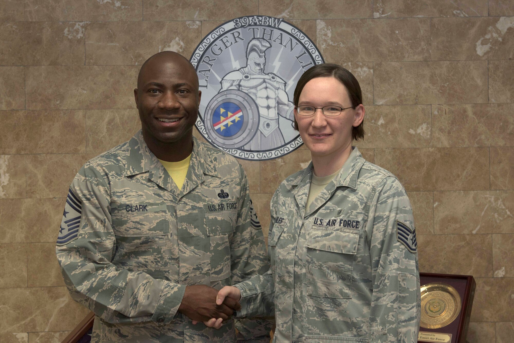 Chief Master Sgt. Vegas Clark, 39th Air Base Wing command chief, stands for a photo with Staff Sgt. Kathryn Hiles, 39th Medical Support Squadron medical laboratory technician before beginning Hiles’ chief shadow day on June 29, 2016. Airmen are chosen for the command chief’s shadow program based on their commander’s recommendation and their dedication to the mission. (U.S. Air Force photo by Airman 1st Class Devin M. Rumbaugh/Released)