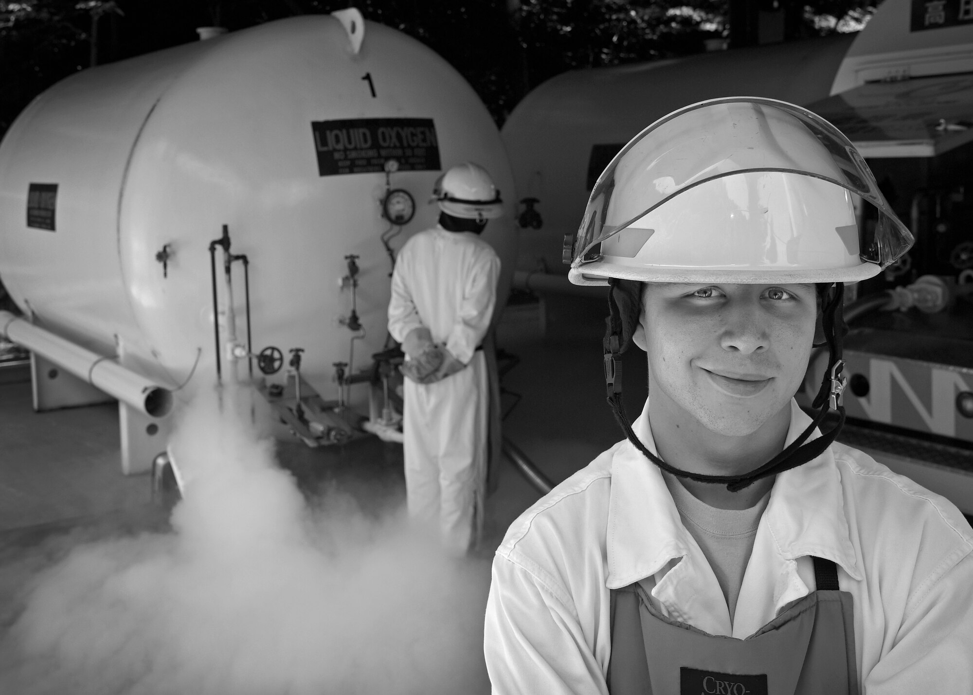 U.S. Air Force Airman Wesley Henderson, a fuels distribution technician with the 35th Logistics Readiness Squadron, oversees a liquid oxygen tank refilling at Misawa Air Base, Japan, June 29, 2016. Liquid oxygen tanks are refilled every three to four months and are used to produce breathable air for aviators during flight The liquid oxygen stored here is for transient aircraft, which use liquid oxygen in their breathing tanks for conversion to oxygen gas during flights. Henderson hails from Topsham, Maine. (U.S. Air Force photo by Senior Airman Deana Heitzman)