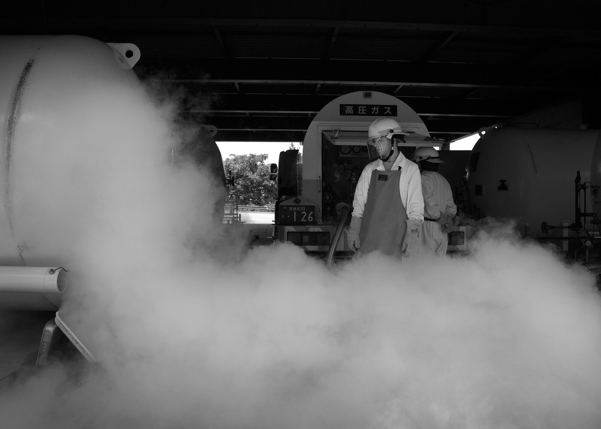 U.S. Air Force Airman Wesley Henderson, a fuels distribution technician with the 35th Logistics Readiness Squadron, oversees a liquid oxygen tank refilling at Misawa Air Base, Japan, June 29, 2016. Liquid oxygen tanks are refilled every three to four months and are used to produce breathable air for aviators during flight. The liquid oxygen stored here is for transient aircraft, which use liquid oxygen in their breathing tanks for conversion to oxygen gas during flights. Henderson hails from Topsham, Maine. (U.S. Air Force photo by Senior Airman Deana Heitzman)