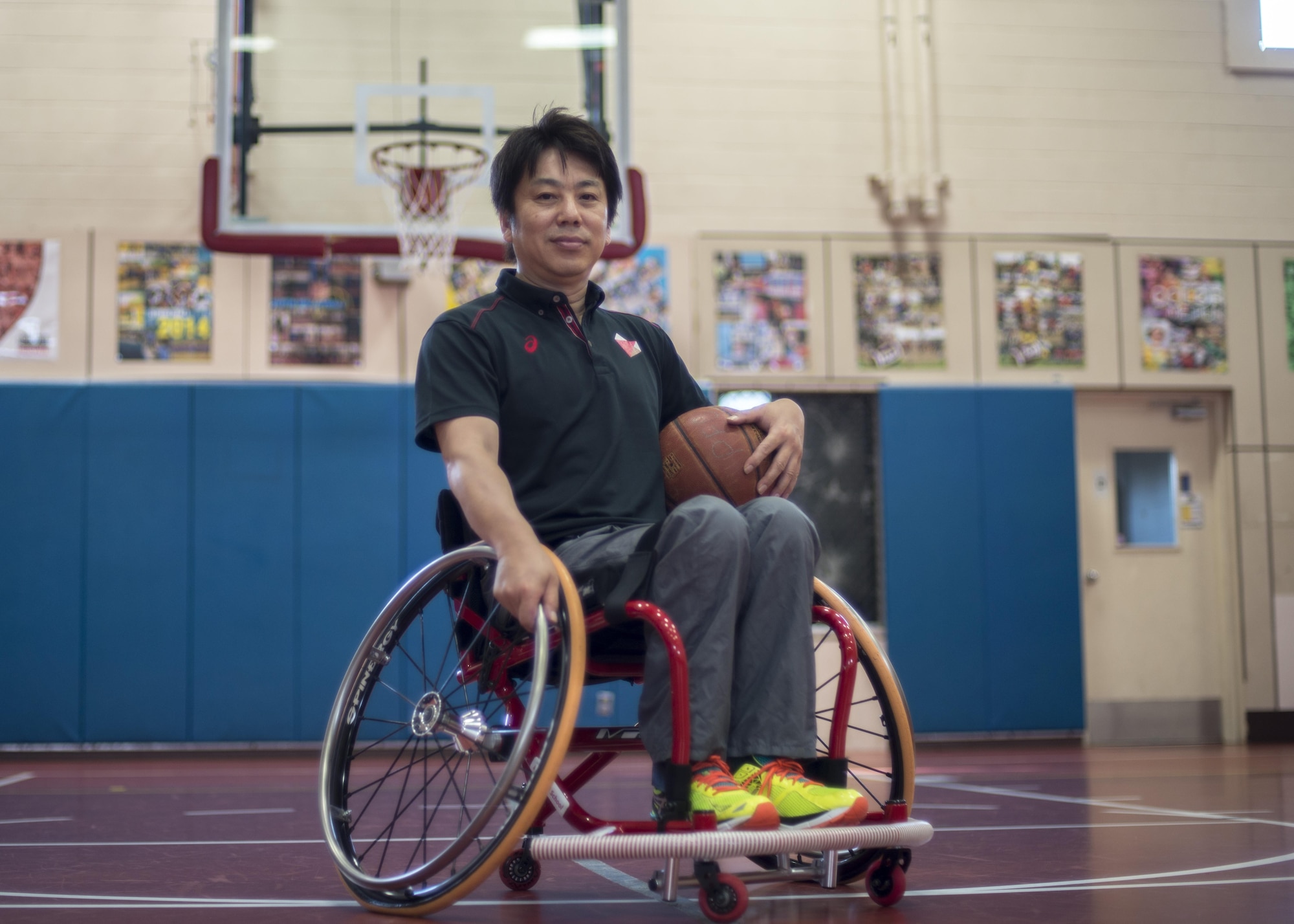 Shinji Negi, a project director with the Nippon Foundation Paralympic Support Center, poses for a photo at Misawa Air Base, Japan, June 28, 2016. Negi travels across the world in order to teach children about life with disabilities and persevering despite difficulties that may occur in life. He was paralyzed from the waist down in high school and went on to become the captain of the Japan Men's National Wheelchair Basketball Team at the 2000 Sydney Paralympic Games. (U.S. Air Force photo by Senior Airman Brittany A. Chase)