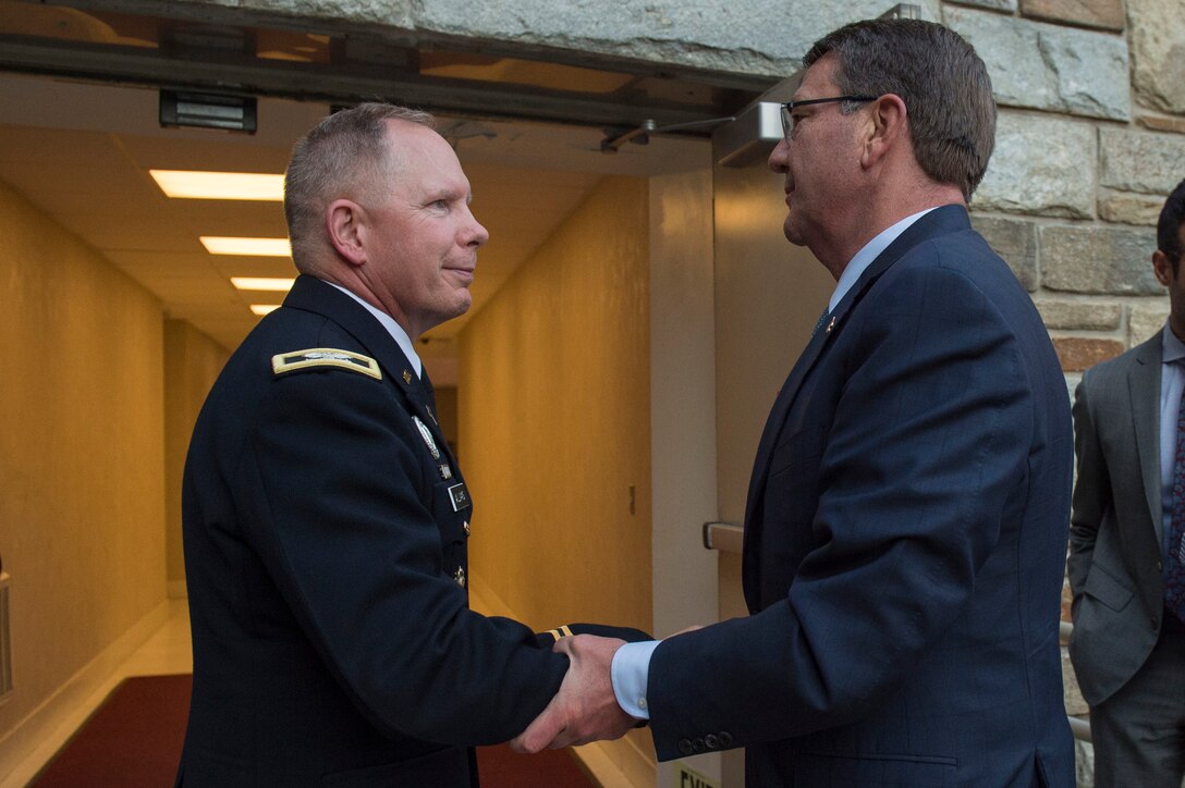 Pentagon Chaplain Army Col. Kenneth Williams greets Defense Secretary Ash Carter before the Defense Department's 18th annual Iftar event at the Pentagon, June 30, 2016. DoD photo by Air Force Senior Master Sgt. Adrian Cadiz