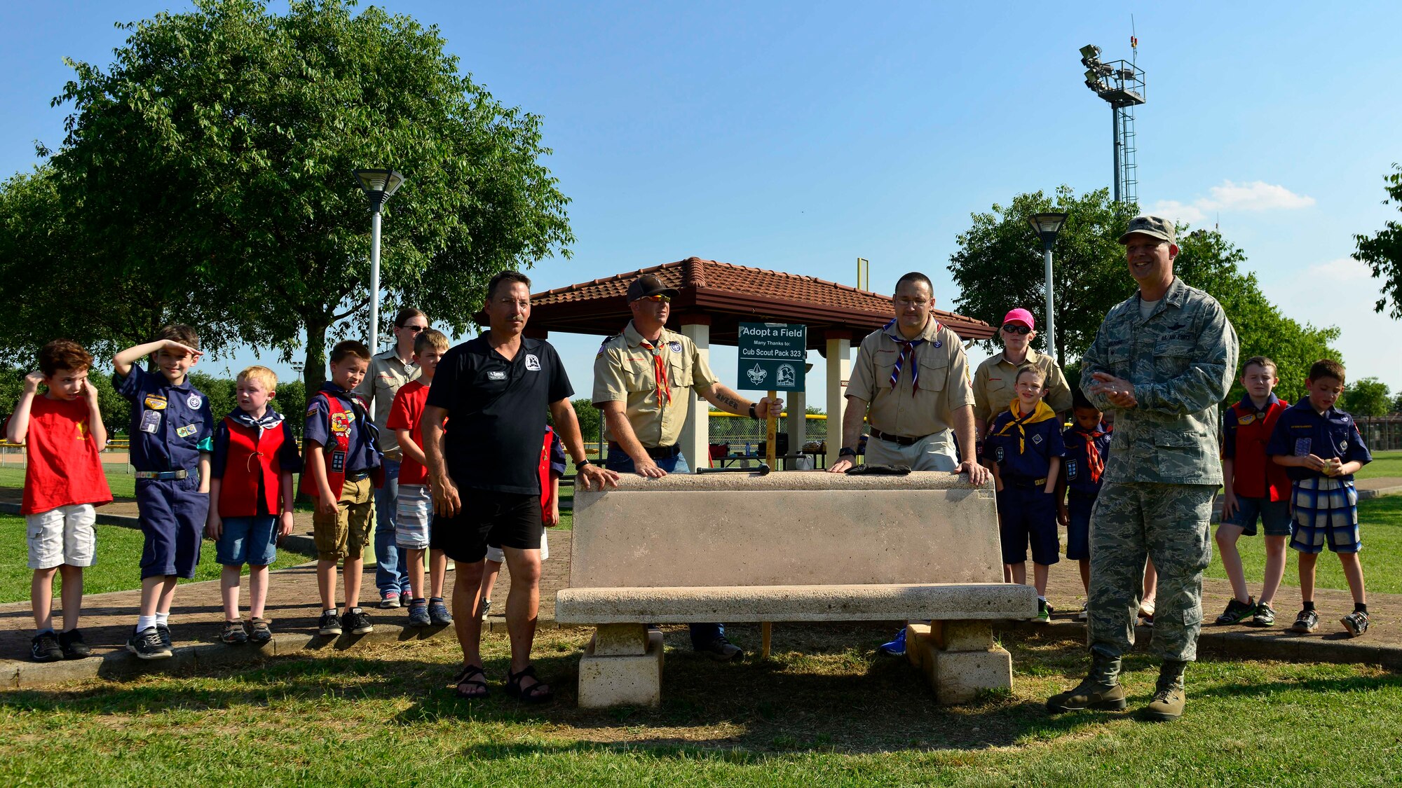 Col. Bryan Wolford, 31st Fighter Wing vice commander, speaks during the “adopt a field” ceremony, June 29, 2016, at Aviano Air Base, Italy. Wolford thanked Aviano Cub Scouts Pack 323 for their efforts in helping Team Aviano enjoy a cleaner park. (U.S. Air Force photo by Airman 1st Class Cary Smith/Released)