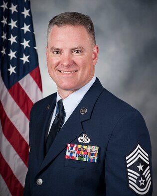Official photo: Chief Master Sgt. Matthew R. Muldowney, command chief, 514th Air Mobility Wing
