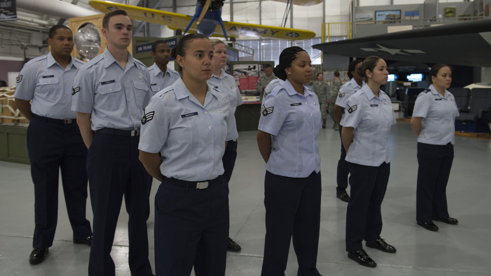 Airmen from the 436th Dental Squadron stand in formation during the 436th Dental Squadron Inactivation Ceremony on June 28, 2016, at the Air Mobility Command Museum on Dover Air Force Base, Del. The Dover AFB Dental Clinic will remain open and operate normally; costumers will experience no interruption in dental services. (U.S. Air Force photo/Senior Airman Zachary Cacicia)