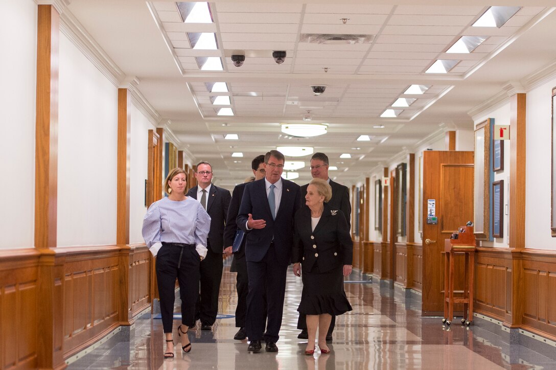 Defense Secretary Ash Carter speaks with Madeleine Albright as they walk to the Hall of Heroes at the Pentagon where Albright will be awarded the Department of Defense Medal for Distinguished Public Service, June 30, 2016. DoD photo by Air Force Senior Master Sgt. Adrian Cadiz