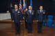 U.S. Air Force Col. Steven Zubowicz, 52nd Mission Support Group commander, left, U.S. Air Force Maj. Duane Fisher, former 52nd Communications Squadron commander, center, and U.S. Air Force Maj. Christopher Waddell, 52nd CS commander, right, stand at attention during the 52nd CS change of command ceremony in the Club Eifel Ballroom at Spangdahlem Air Base, Germany, July 1, 2016. Zubowicz was the presiding officer for ceremony and exchanged command of the 52nd CS from Fisher to Waddell. (U.S. Air Force photo by Senior Airman Luke Kitterman/Released)