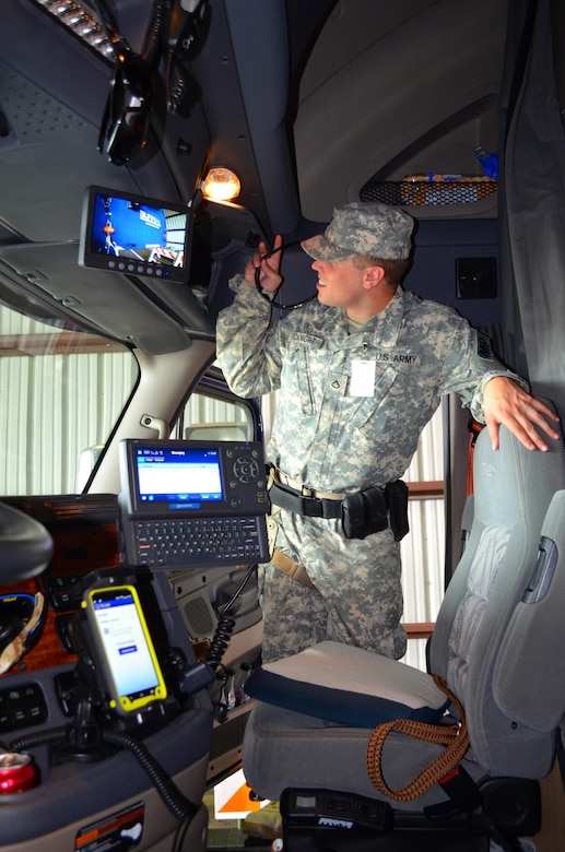 A soldier assigned to the North Carolina Army National Guard’s 514th Military Police Company searches a vehicle, June 16, 2016, at Military Ocean Terminal Sunny Point, N.C., during Operation Vigilant Seahawk, an exercise designed to improve communication and coordination with state and federal partners during disaster response and recovery operations. North Carolina Army National Guard photo by Sgt. Odaliska Almonte