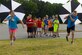 Science and Technology Academies Reinforcing Basic Aviation and Space Exploration students run a relay race with umbrellas to learn about drag, June 21, 2016, at Greenwood Middle School, Goldsboro, North Carolina. The STARBASE students were divided into four flights of 16 and learned about the different components of flight, including the laws of motion, compass reading and rocketry. (U.S. Air Force photo/Airman 1st Class Ashley Williamson/Released)
