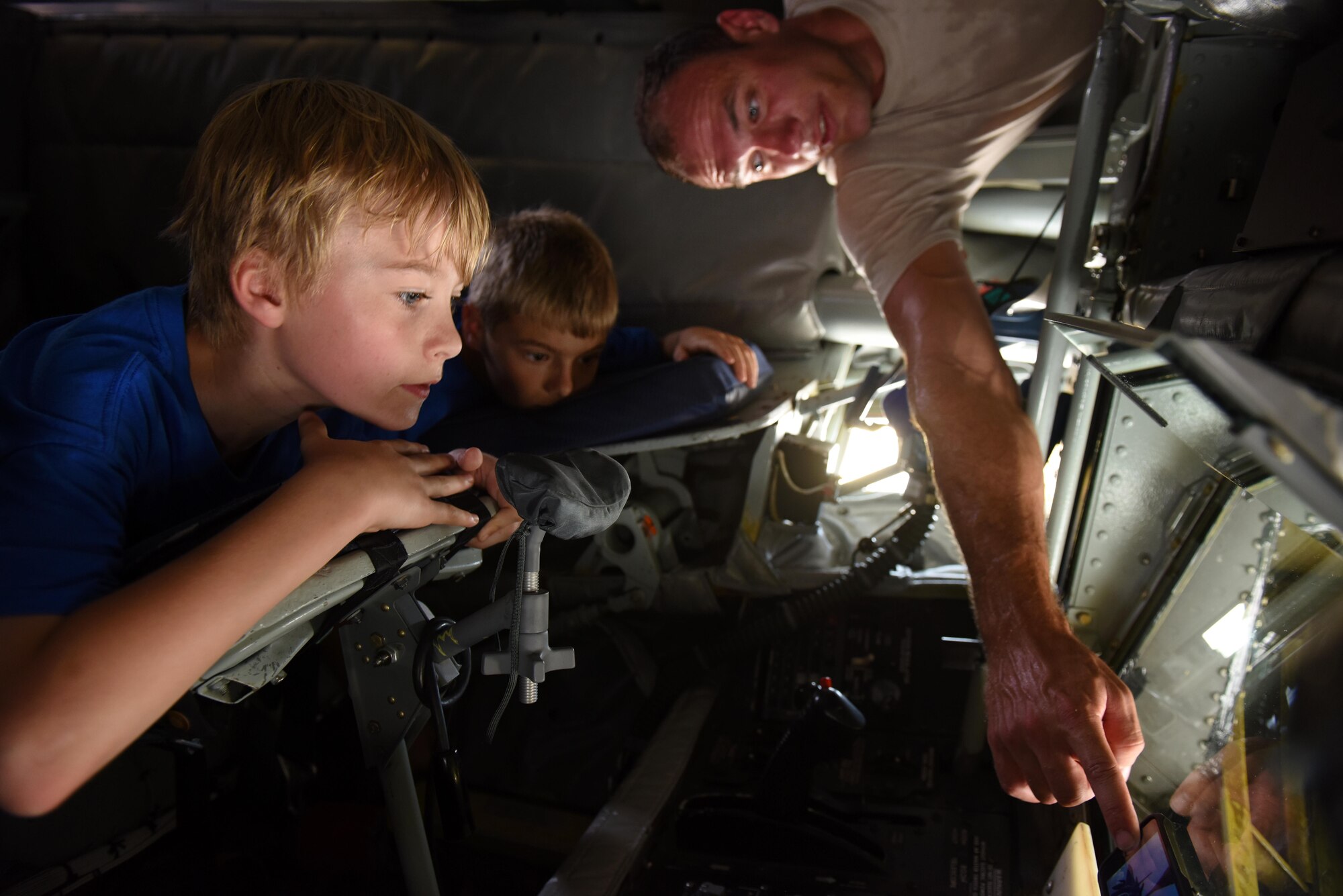 Senior Airman Casey Lackie, 911th Air Refueling Squadron in-flight refueler, presents a video demonstration to Science and Technology Academies Reinforcing Basic Aviation and Space Exploration students to show how the boom in a KC-135 Stratotanker works, June 23, 2016, at Seymour Johnson Air Force Base, North Carolina. Throughout the week, STARBASE students toured the base and learned who and what is involved in making the jets fly. (U.S. Air Force photo/Airman 1st Class Ashley Williamson/Released)