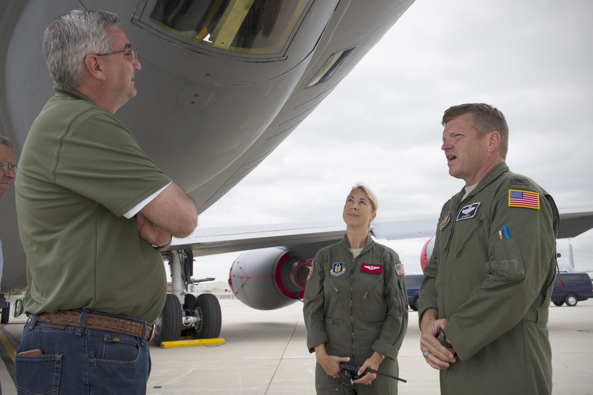 Indiana Lt. Gov. Eric Holcomb (left), Master Sgt. Deborah Wood, 74th Air Refueling Squadron inflight technician, and Col. Paul Gates, 434th Air Refueling Wing vice commander, stand below a KC-135R Stratotanker as part of Holcomb’s first tour of Grissom Air Reserve Base, Ind., June 28, 2016. During Holcomb’s tour of a KC-135R static display, as he learned about the 434th ARW’s operational capabilities as well as the base’s successful generation of aircraft in support of the Air Mobility Command. (U.S. Air Force photo/Staff Sgt. Katrina Heikkinen)