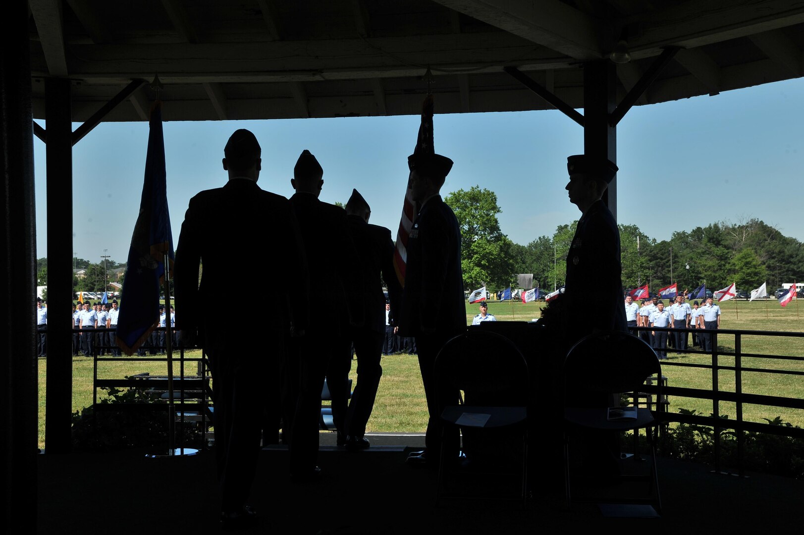 Col. Col. Thomas Hensley, 70th Intelligence, Surveillance and Reconnaissance Wing commander, Col. Parker Wright and Col. Aaron Drake approach their seats during the 659th Intelligence, Surveillance and Reconnaissance Group change of command ceremony June 29, 2016 at Fort George G. Meade, Md. The 659th ISRG conducts global integrated cyber ISR operations with Air Force, Joint, and Intelligence Community partners to detect, characterize, and mitigate cyber threats, exploit computer networks and enable full-spectrum cyberspace operations. (U.S. Air Force photo/Staff Sgt. Alexandre Montes)  