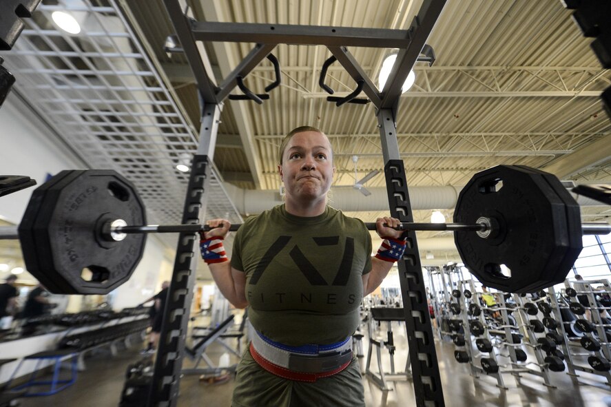 Staff Sgt. Janice Aninsman, 436th Security Forces Squadron intelligence and force protection NCO in charge, squats 240 pounds during a training session June 24, 2016, at the Fitness Center on Dover Air Force Base, Del. Aninsman holds the Women’s Raw American Record in the Military Open division and the Delaware state Raw Record for squats at 130 kilograms. (U.S. Air Force photo/Senior Airman William Johnson)