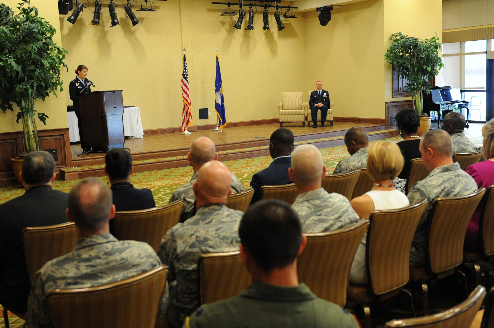 Col. Michele Edmondson, 81st Training Wing commander, delivers remarks during the retirement ceremony for Col. Dennis Scarborough, 81st TRW vice commander, at the Bay Breeze Event Center June 28, 2016, on Keesler Air Force Base, Miss. Scarborough retired with 27 years of military service. He has served multiple tours as an F-15C instructor and evaluator and has held positions in the fields of defense policy, operational plans, safety and aircraft maintenance. He has commanded at the squadron level and served as an operations group deputy commander. (U.S. Air Force photo by Kemberly Groue/Released)