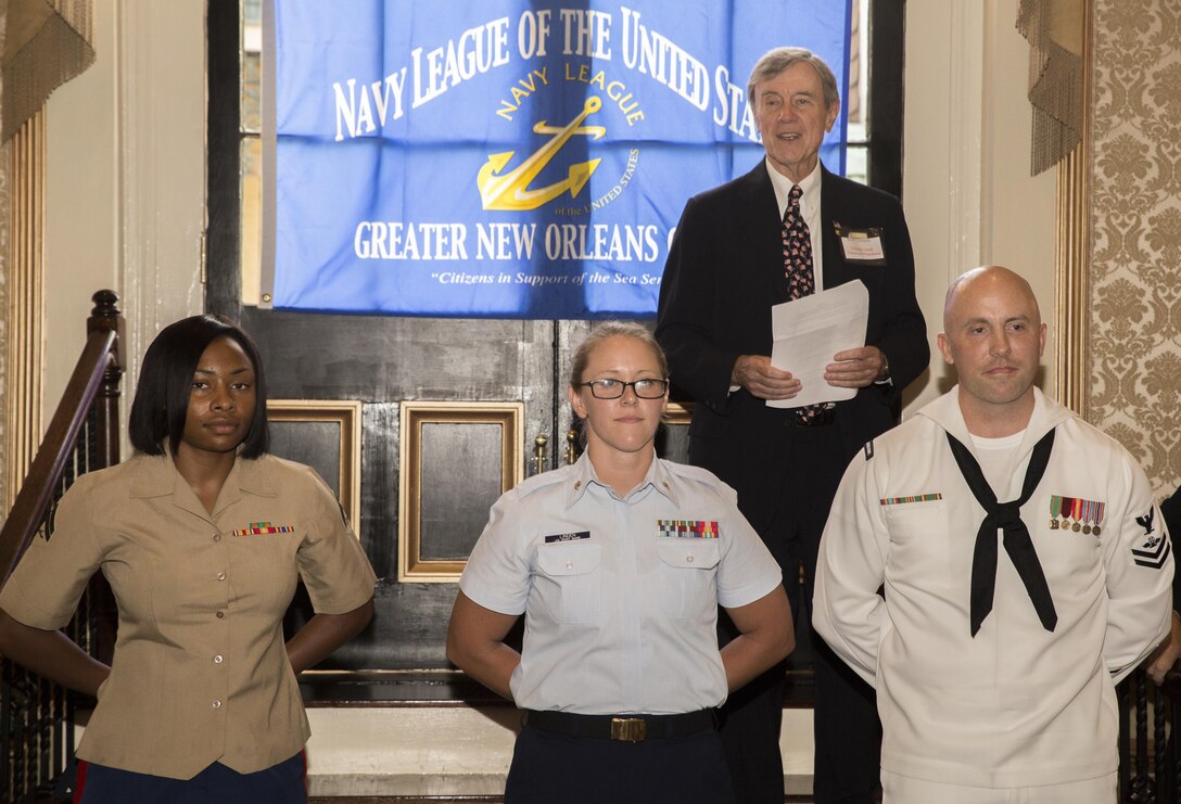 Service members from units in the New Orleans area are recognized as the Sailor, Marine and Coast Guardsman of the Year for their respective units by the Navy League of the United States Greater New Orleans Council  at “A Taste’n Toast to Our Armed Services” event at the Bourbon Orleans Hotel, New Orleans, July 30, 2016. Cpl. Shereka K. Slater (left), an administrative specialist with Marine Forces Reserve Installation Personnel Administration Center, received the Marine of the Year Award for Marine Forces Reserve. The Navy League is comprised of 40,000 civilians in more than 240 councils around the world working to support sea service members and their families. (U.S. Marine Corps photo by Sgt. Ian Leones/Released)