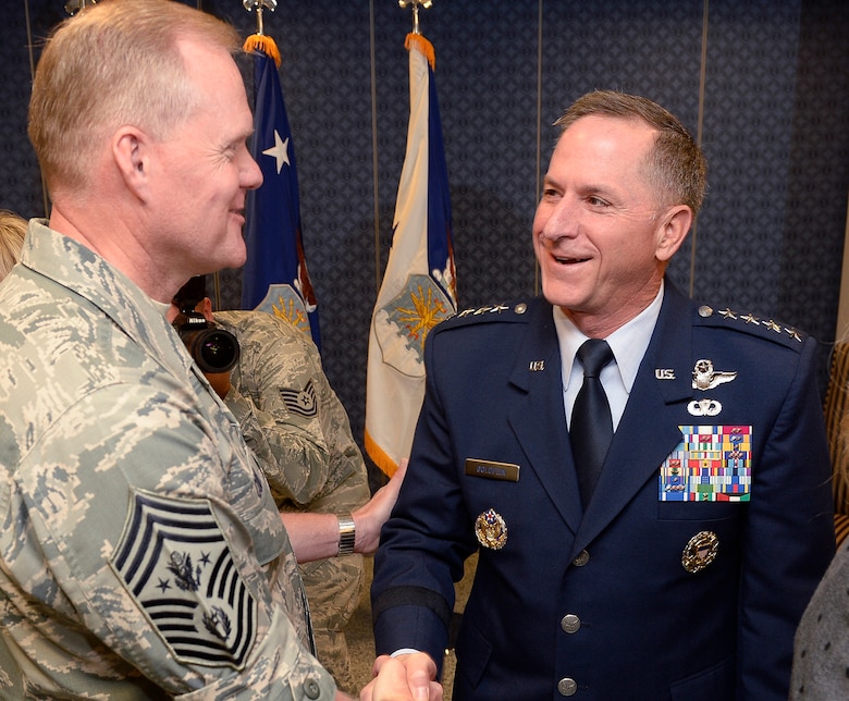Chief Master Sgt. of the Air Force James A. Cody congratulates Air Force Chief of Staff Gen. David L. Goldfein after the general was sworn in during a ceremony at the Pentagon in Washington, D.C., June 1, 2016. Goldfein became the 21st chief of staff of the Air Force. (U.S. Air Force photo/Andy Morataya)