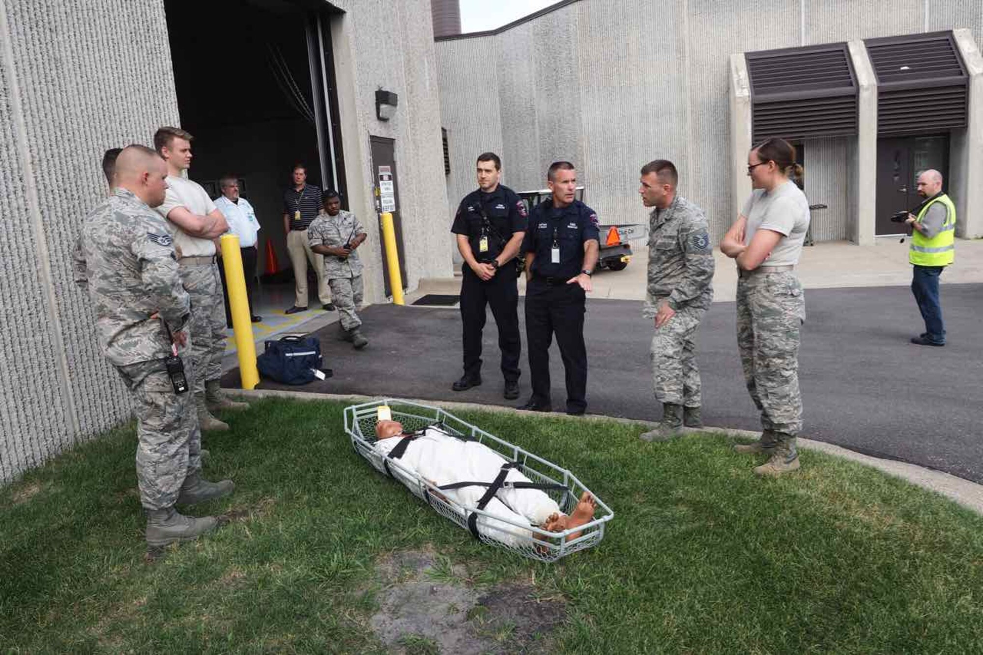 Members of the Metropoitan Airport Commission Fire Dept. discuss emergency procedures with 934 AW Airmen.