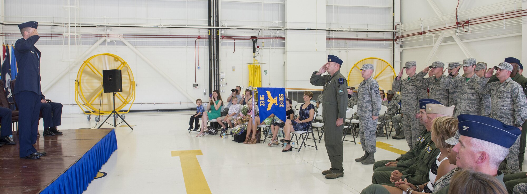Lt. Col. Scott Gunn, 33rd Operations Support Squadron commander, renders his first salute to the Airmen of the 33rd OSS during the 33rd OSS change of command ceremony June 24, 2016, at Eglin Air Force Base, Fla. The 33rd OSS oversees F-35 weapons and tactics training and aircrew flight equipment training at Eglin AFB as well as the training syllabus and operational intelligence training for both AFSOC and the F-35 program at Eglin AFB. (U.S. Air Force photo by Senior Airman Stormy Archer/Released)