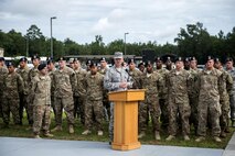 U.S. Air Force Maj. Gen. Anthony German, New York Air National Guard commander, gives remarks during a memorial ceremony, June 30, 2016, at Moody Air Force Base, Ga. German mentioned that he was honored to be in the company of the best defenders in the world and asked that people in attendance keep the families of those who have fallen in their thoughts and prayers.  (U.S. Air Force photo by Airman 1st Class Janiqua P. Robinson/Released)