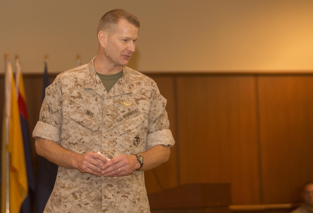 Col. Derrick R. Heyl, commanding officer of Headquarters Battalion, Marine Forces Reserve, addresses the crowd during a change of command ceremony at Marine Corps Support Facility New Orleans, July 1, 2016. Before assuming this position, Heyl served as the Assistant Chief of Staff G-3 with Headquarters 4th Marine Aircraft Wing, MARFORRES. (U.S. Marine Corps photo by Sgt. Ian Leones/Released)