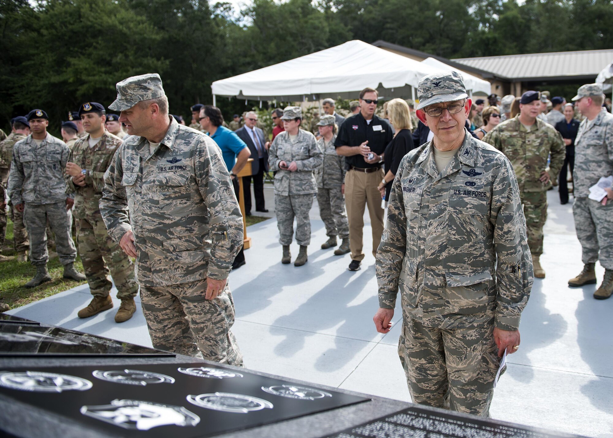 U.S. Air Force Brig. Gen. Timothy LaBarge, New York Air National Guard chief of staff, left, and Col. Howard Wagner, 105th Airlift Wing commander, view a memorial, June 30, 2016, at Moody Air Force Base, Ga. Many organizations from the base and the local community donated time, materials and funds toward the materials and construction of the memorial. (U.S. Air Force photo by Airman 1st Class Janiqua P. Robinson/Released)