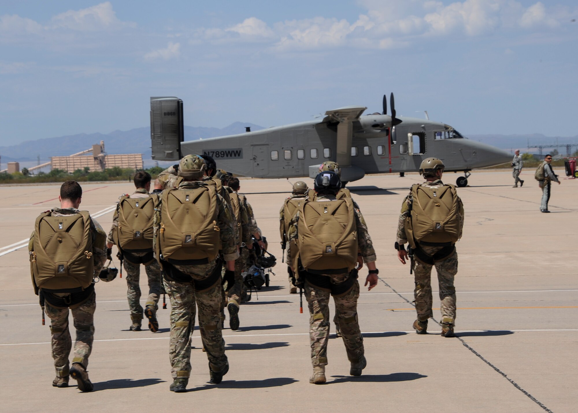 U.S. Airmen prepare to board a C-23 Sherpa during the Military Freefall Jumpmaster Course at Davis-Monthan Air Force Base, Ariz., June 28, 2016. During each free fall, the success of the mission and the lives of others are in the hands of the jumpmasters. (U.S. Air Force photo by Airman Nathan H. Barbour/Released)