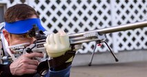 U.S. Air Force Maj. Robert Davis, 93d Air Ground Operations Wing director of complaints, stares through his Anschutz 1913 .22 caliber rifle during shooting practice, July 1, 2016 at Valdosta, Ga. Davis earned the Air Force Wounded Warrior Program’s shooting coaching position due to his extensive background in weaponry as an AF Office of Special Investigations special agent and competitive shooting. (U.S. Air Force photo by Airman 1st Class Greg Nash/Released)
