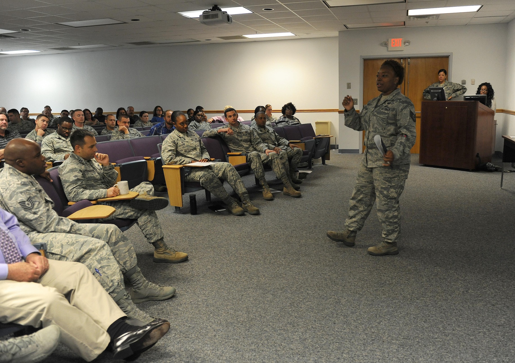 Tech. Sgt. DeMonique Pettaway, 81st Training Wing Equal Opportunity Office NCO in charge, delivers a safety brief to Keesler personnel during an 81st TRW Stand Down Event at the Sablich Center June 29, 2016 on Keesler Air Force Base, Miss. Personnel received a safety brief on driving while under the influence of alcohol and learned ways to prevent DUIs in their units. (U.S. Air Force photo by Kemberly Groue/Released)