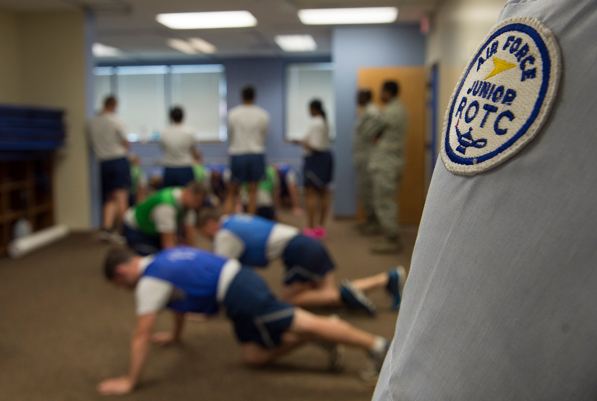 U.S. Air Force Junior ROTC cadets were introduced to the operational Air Force’s physical training test during a shadow day at Langley Air Force Base, Va., June 29, 2016. The cadets toured the base to learn more about the operational Air Force and military lifestyle. (U.S. Air Force photo by Airman 1st Class Kaylee Dubois)