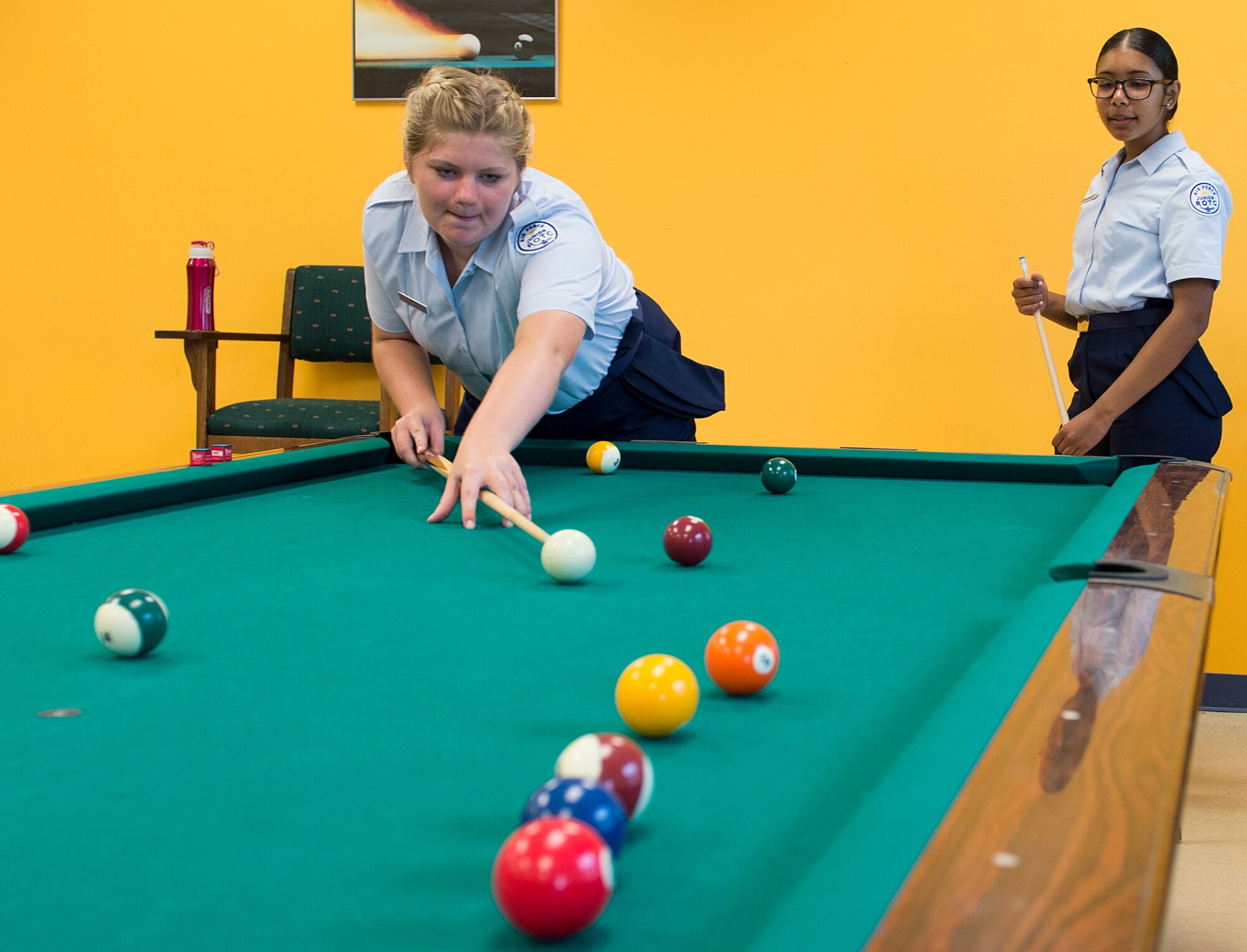 U.S. Air Force Junior ROTC cadets shoot pool during a shadow day at Langley Air Force Base, Va., June 29, 2016. The cadets visited the Community Commons to learn about the 633rd Force Support Squadron’s mission and facilities at Langley.  (U.S. Air Force photo by Airman 1st Class Kaylee Dubois)