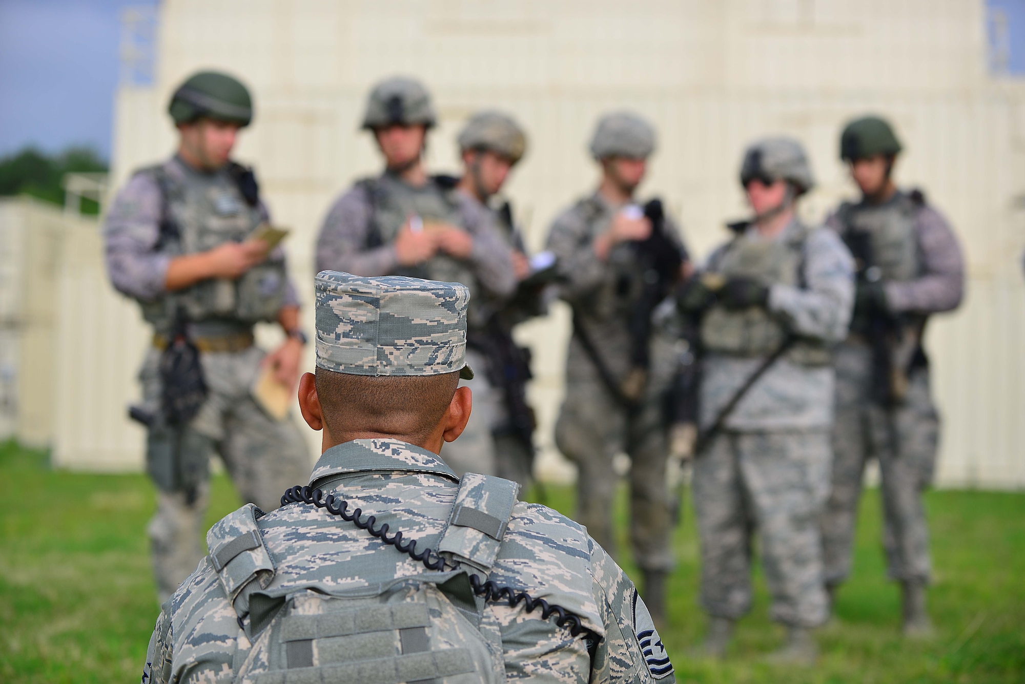 A squad of defenders from the 633rd Security Forces Squadron brief the operations order to U.S. Air Force Master Sgt. Christopher Ricks, 633 SFS, NCO in charge of training during Combat Readiness Training at Langley Air Force Base, Va., June 27, 2016.  CRT is a requirement before a SF member deploys acting as a refresher and prerequisite for predeployment training.  (U.S. Air Force photo by/Tech. Sgt. Daylena S. Ricks)