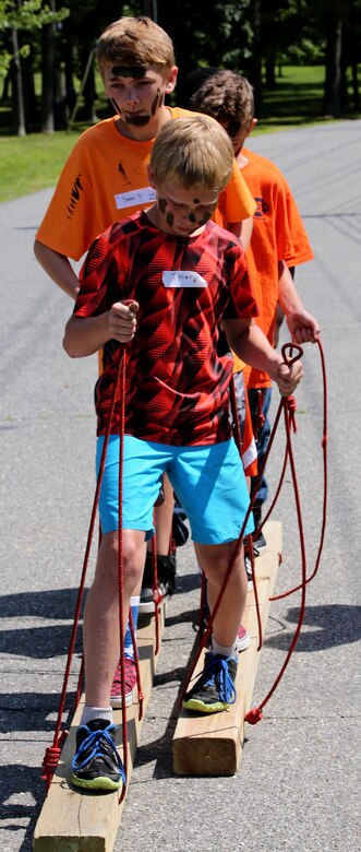 Middle School teens from the Department of Defense bases around South Maryland and Virginia participated in L.I.N.K.S. for Teens at the Naval Surface Facility Indian Head, Md., June 30, 2016. The event was hosted by Chemical, Biological, Incident Response Force, U.S. Marine Corps Forces Command, and Joint Base Myer-Henderson Hall. The Teens participated in seven different stations related to the physical and mental preparation a Marine goes under on a daily basis. The teens learned various different skills to build teamwork and camaraderie between peers, as well as the core values of the Marines and goals for the future. CBIRF is an active duty Marine Corps unit that, when directed, forward-deploys and/or responds with minimal warning to a chemical, biological, radiological, nuclear or high-yield explosive (CBRNE) threat or event in order to assist local, state, or federal agencies and the geographic combatant commanders in the conduct of CBRNE response or consequence management operations, providing capabilities for command and control; agent detection and identification; search, rescue, and decontamination; and emergency medical care for contaminated personnel. (Official USMC Photo by Lance Cpl. Maverick S. Mejia/RELEASED)