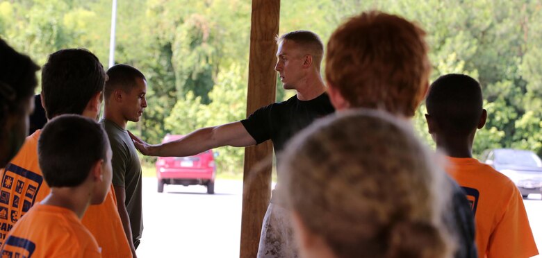 Middle School teens from the Department of Defense bases around South Maryland and Virginia participated in L.I.N.K.S. for Teens at the Naval Surface Facility Indian Head, Md., June 30, 2016. The event was hosted by Chemical, Biological, Incident Response Force, U.S. Marine Corps Forces Command, and Joint Base Myer-Henderson Hall. The Teens participated in seven different stations related to the physical and mental preparation a Marine goes under on a daily basis. The teens learned various different skills to build teamwork and camaraderie between peers, as well as the core values of the Marines and goals for the future. CBIRF is an active duty Marine Corps unit that, when directed, forward-deploys and/or responds with minimal warning to a chemical, biological, radiological, nuclear or high-yield explosive (CBRNE) threat or event in order to assist local, state, or federal agencies and the geographic combatant commanders in the conduct of CBRNE response or consequence management operations, providing capabilities for command and control; agent detection and identification; search, rescue, and decontamination; and emergency medical care for contaminated personnel. (Official USMC Photo by Lance Cpl. Maverick S. Mejia/RELEASED)