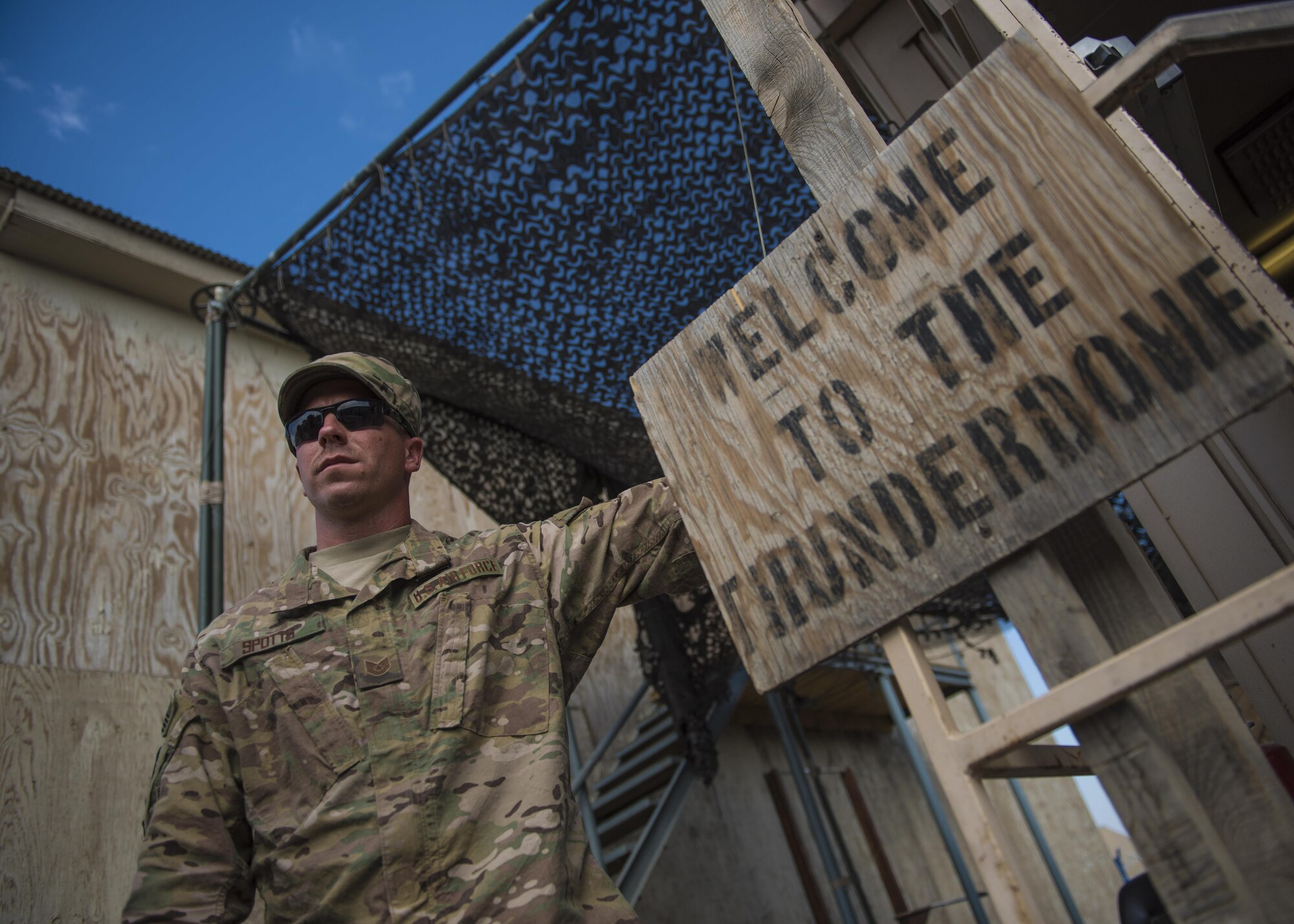 Tech. Sgt. Brent Spotts, 455th Expeditionary Operational Support Squadron dirt boy, poses for a photo during a pre-inspection, July 1, 2016, Jalalabad Airfield, Afghanistan. Spotts is forward deployed from the 455th Expeditionary Civil Engineer Squadron in Bagram, Afghanistan. As the only civil engineer in Jalalabad, Spotts is responsible for the airfield electrical systems, structure, and pavements and equipment. (U.S. Air Force photo by Senior Airman Justyn M. Freeman)