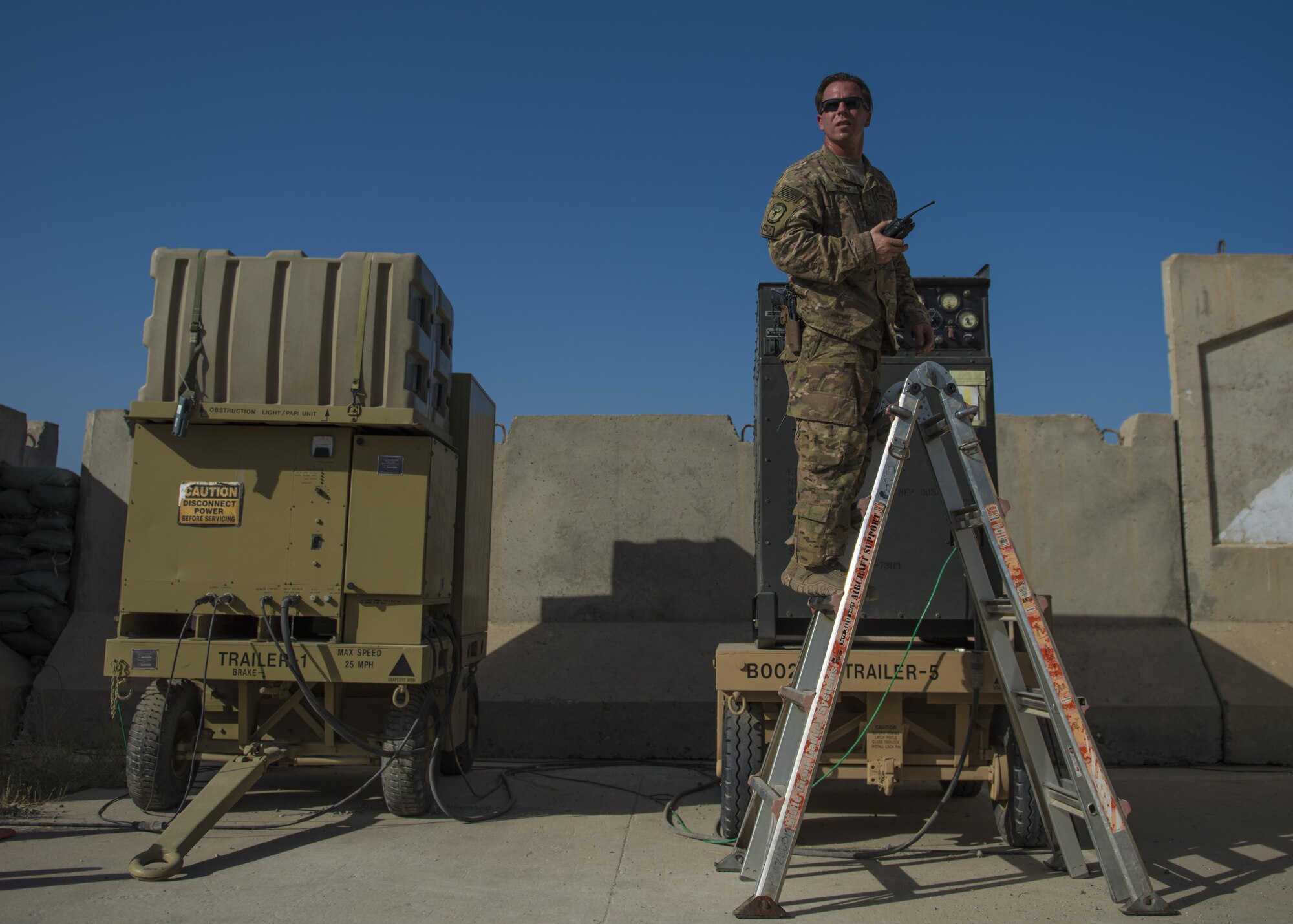 Tech. Sgt. Brent Spotts, 455th Expeditionary Operational Support Squadron dirt boy, checks to see if the emergency airfield lighting system (EALS) is on, July 1, 2016, Jalalabad Airfield, Afghanistan. As the only civil engineer in Jalalabad, Spotts is responsible for many aspects of civil engineering and responsible in helping keep the airfield operational. (U.S. Air Force photo by Senior Airman Justyn M. Freeman)